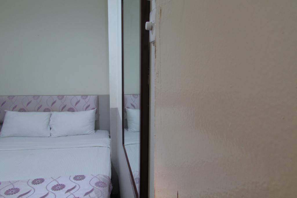 Meriton Hotel Singapur Habitación foto